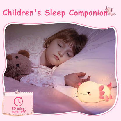 The axolotl night light used as a safe sleep companion for a toddler